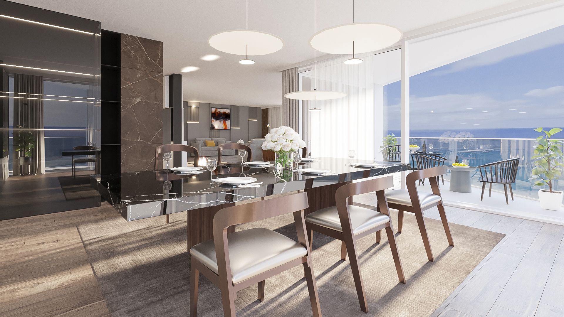 Dining room with a black marble table, the living area and balcony beyond