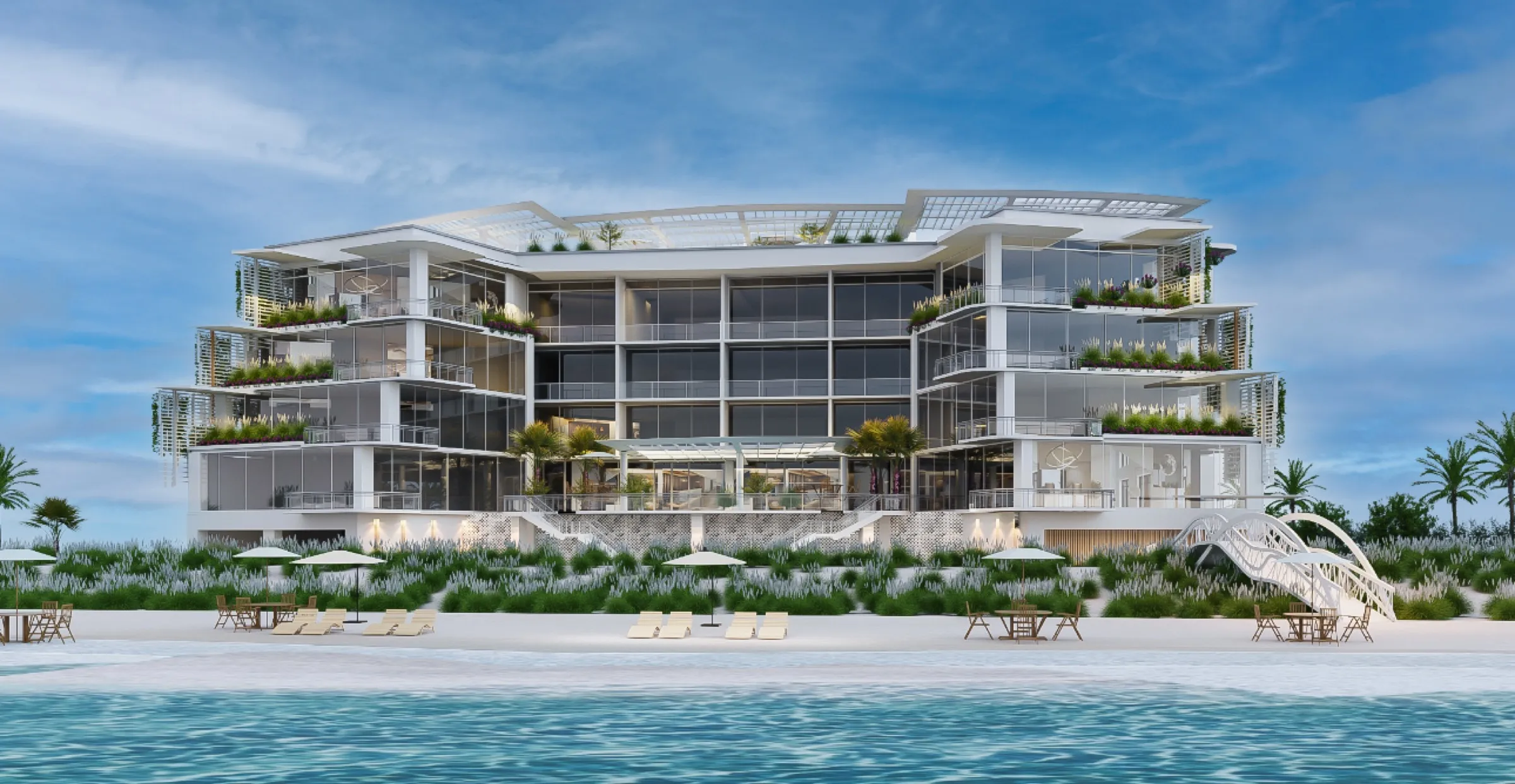 Solarus from the beach, with its planted terraces and footbridge to the sand